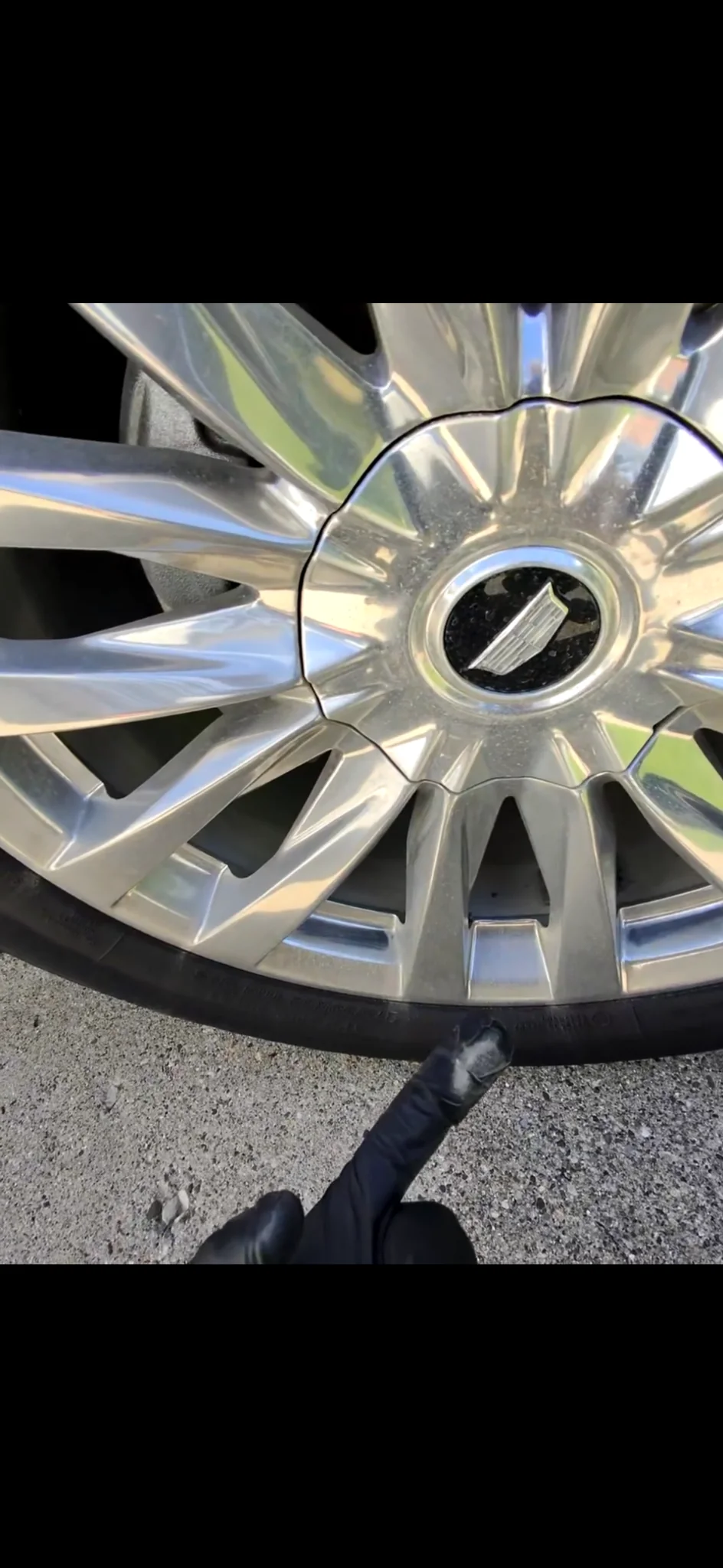 Chrome wheel before detailing, dull and oxidized